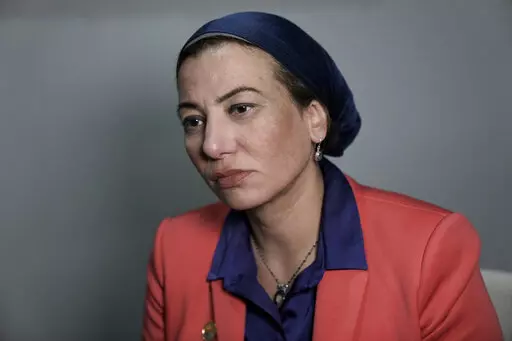 Egypt's Environment Minister Yasmine Fouad speaks with The Associated Press at the COP27 U.N. Climate Summit, Saturday, Nov. 12, 2022, in Sharm el-Sheikh, Egypt. (AP Photo/Nariman El-Mofty)