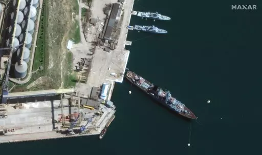 This satellite image provided by Maxar Technologies shows cruiser Moskva in port Sevastopol in Crimea on April 7, 2022. (Satellite image ©2022 Maxar Technologies via AP)