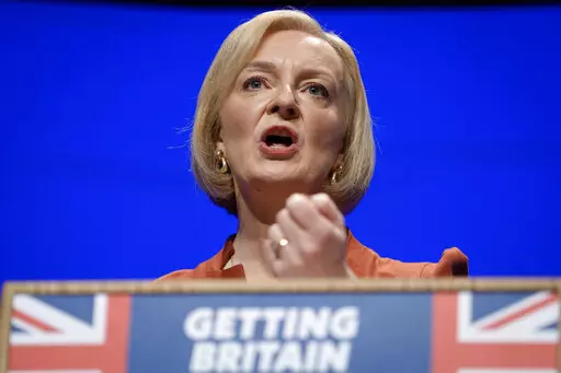Britain's Prime Minister Liz Truss makes a speech at the Conservative Party conference at the ICC in Birmingham, England, Oct. 5, 2022. After an acrimonious divorce and years of bickering, Britain’s government looks like it wants to make up with the European Union. On Thursday, Oct. 6 Truss travels to the Czech Republic to attend the first meeting of the European Political Community, an initiative of French President Emmanuel Macron that brings together EU members and countries outside the uni