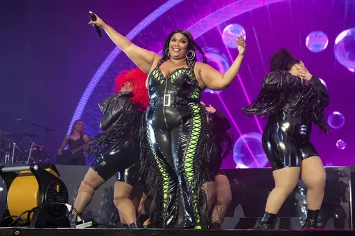 Lizzo performs at the BottleRock Napa Valley Music Festival on May 27, 2023, in Napa, Calif. Lizzo has been sued by three former dancers who accuse the Grammy winner of sexual harassment and allege the singer and her production company created a hostile work environment. The civil lawsuit filed Tuesday, Aug. 1, 2023, in Los Angeles County Superior Court claims Lizzo pressured one of the dancers to engage with nude performers at a club in Amsterdam and shamed another dancer for her weight gain be
