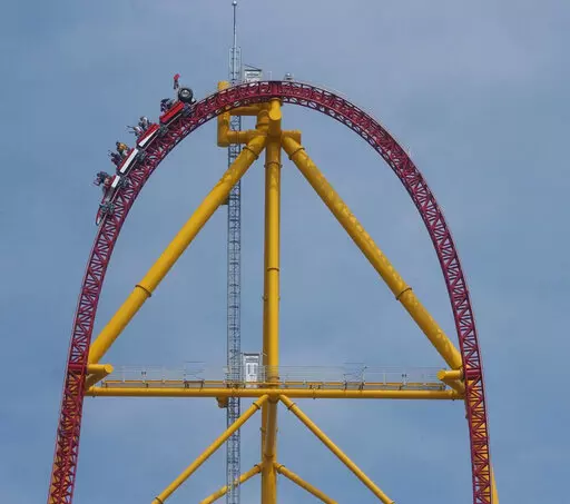 Riders on the Top Thrill Dragster speed along on May 1, 2003, at Cedar Point Amusement Park, in Sandusky, Ohio. The amusement park in Ohio is permanently closing the world’s second-tallest roller coaster. The decision announced Tuesday, Sept. 6, 2022, by Cedar Point comes a year after a small metal object flew off the 420-foot (128-meter) tall Top Thrill Dragster coaster and struck a woman in the head at the park in Sandusky. (AP Photo/Paul M. Walsh, File)