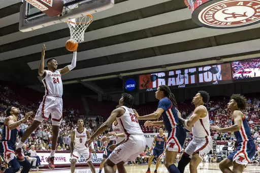 Alabama forward Brandon Miller (24) rebounds against Mississippi during the first half of an NCAA college basketball game, Tuesday, Jan. 3, 2023, in Tuscaloosa, Ala. (AP Photo/Vasha Hunt)