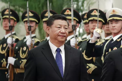 Chinese President Xi Jinping and Finnish President Sauli Niinisto (unseen) review an honor guard at the Great Hall of the People in Beijing, Monday, Jan. 14, 2019. With Russia’s military failings in Ukraine mounting, no country is paying closer attention than China to how a smaller, outgunned force has badly bloodied what was thought to be one of the world’s strongest armies. (AP Photo/Andy Wong, File)