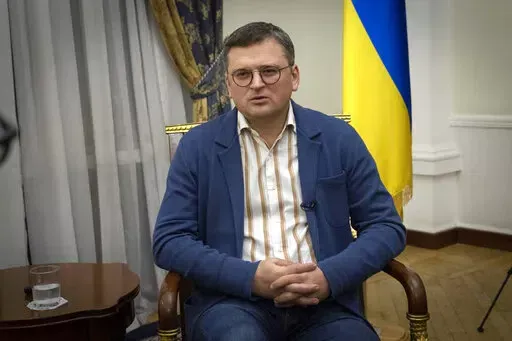 Ukraine's Foreign Minister Dmytro Kuleba talks during an interview with The Associated Press in Kyiv, Ukraine, Monday, Dec. 26, 2022. (AP Photo/Efrem Lukatsky)
