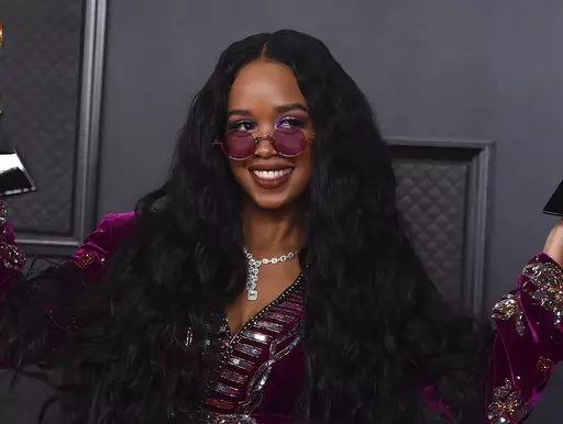 H.E.R. appears at the 63rd annual Grammy Awards in Los Angeles on March 14, 2021. The four-time Grammy winner will embark on her 19-city Back of My Mind tour in early April while separately joining Coldplay for their world tour as a supporting act later this month. (Photo by Jordan Strauss/Invision/AP, File)