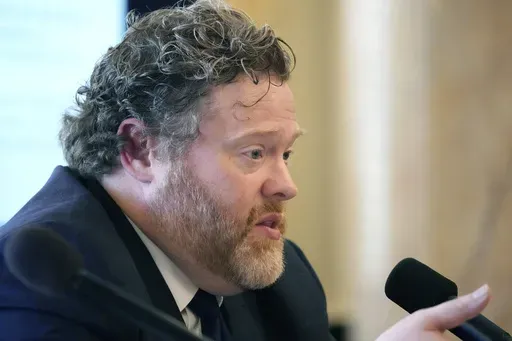 Drew Snyder, executive director of the Mississippi Division of Medicaid, gives members of the House of Representatives Medicaid Committee an outline of the state's Medicaid program at the Mississippi Capitol, Feb. 7, 2024, in Jackson, Miss. (AP Photo/Rogelio V. Solis, File)