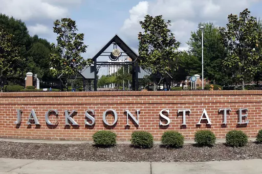 A sign marks the west entrance at Jackson State University in Jackson, Miss., May 31, 2017. Higher education officials in Mississippi voted Thursday, Nov. 16, 2023, to name Marcus L. Thompson as new president of Jackson State University, the state's largest historically Black university. (AP Photo/Rogelio V. Solis, File)