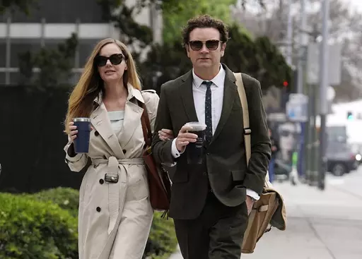 Danny Masterson and his wife Bijou Phillips arrive for closing arguments in his second rape trial, Tuesday, May 16, 2023, in Los Angeles. Masterson is charged with raping three women at his Los Angeles home between 2001 and 2003. (AP Photo/Chris Pizzello)