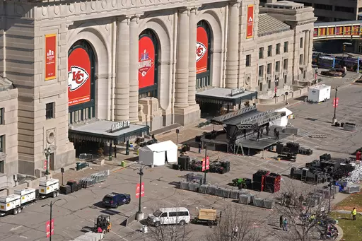 Workers dismantle the stage outside of Union Station Thursday, Feb. 15, 2024, in Kansas City, Mo. On Friday, Feb. 16, The Associated Press reported on stories circulating online incorrectly claiming a 44-year-old migrant was identified as one of the shooters at the Kansas City Chiefs’ Super Bowl parade on Wednesday. (AP Photo/Charlie Riedel, File)