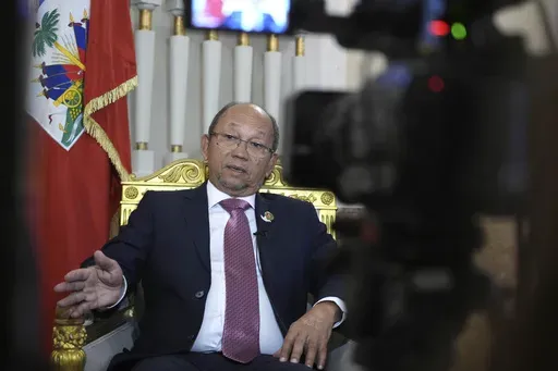 Leslie Voltaire, the president of Haiti's Transition Council, talks during an interview with the Associated Press in Rome, Saturday, Jan. 25, 2025. (AP Photo/Alessandra Tarantino)