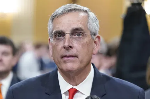 Brad Raffensperger, Georgia Secretary of State, listens as the House select committee investigating the Jan. 6 attack on the U.S. Capitol continues to reveal its findings of a year-long investigation, at the Capitol in Washington, June 21, 2022. (AP Photo/Jacquelyn Martin, File)