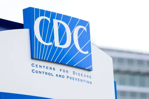 A sign with the CDC logo is displayed at the entrance to the agency's headquarters in Atlanta, on Sunday, March 2, 2025. (Miguel Martinez/Atlanta Journal-Constitution via AP)
