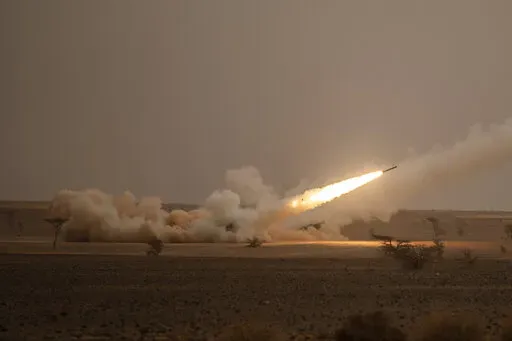 A launch truck fires the High Mobility Artillery Rocket System (HIMARS) at its intended target during the African Lion military exercise in Grier Labouihi complex, southern Morocco, on June 9, 2021. U.S. leaders from President Joe Biden on down are being careful not to declare a premature victory, after a Ukrainian offensive forced Russian troops into a messy retreat in the north. Lawmakers particularly pointed to the precision weapons and rocket systems that the U.S. and Western nations have pr