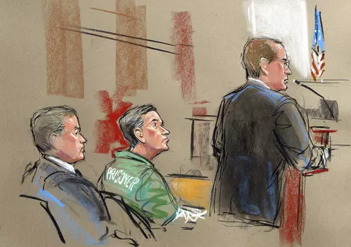 In this artist depiction, U.S. Attorney Randy Bellows, right, addresses the court during the sentencing of convicted spy Robert Hanssen, center, seen with his attorney Plato Cacheris, left, at the federal courthouse in Alexandria, Va., May 10, 2002. Hanssen was given a life sentence. The former FBI agent who took more than $1.4 million in cash and diamonds to trade secrets with Russia and the former Soviet Union in one of the most notorious spying cases in American history has died in prison.(Wi