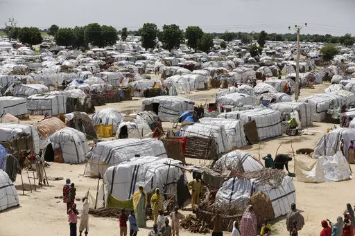 A top view of one of the biggest camp for people displaced by Islamist extremists in Maiduguri, Nigeria on Aug. 28, 2016. Droughts, flooding and a shrinking Lake Chad caused in part by climate change is fueling conflict and migration in the region and needs to better addressed, a report said Thursday, Jan. 19, 2023. ( AP Photo/Sunday Alamba, File)