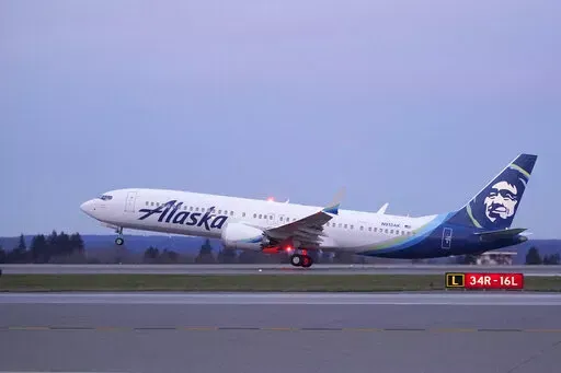 The first Alaska Airlines passenger flight on a Boeing 737-9 Max airplane takes off, Monday, March 1, 2021, on a flight to San Diego from Seattle-Tacoma International Airport in Seattle. The subscription pricing model is trending in the travel industry. Alaska Airlines recently launched a subscription service for West Coast flyers, offering 1-cent flights (on top of a monthly fee) for flights between California, Nevada and Arizona.  (AP Photo/Ted S. Warren, File)
