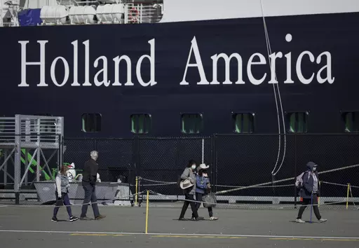 A Holland America cruise ship is shown in Victoria, Canada on Saturday, April 9, 2022. Two crew members on a Holland America cruise ship died during an “incident” in the ship's engineering space, the cruise line said. The unidentified crew members died Friday, March 22, 2024, while the Florida-based Nieuw Amsterdam was at Half Moon Cay in the Bahamas, Holland America said in a statement.(Darryl Dyck/The Canadian Press via AP)