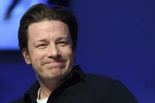 British chef Jamie Oliver attends a panel session during the 47th annual meeting of the World Economic Forum, WEF, in Davos, Switzerland, Jan. 18, 2017. (Laurent Gillieron/Keystone via AP, file)