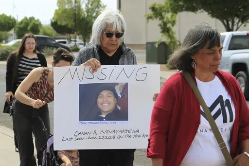 Families and victims advocates participate in a prayer walk around the Indian Pueblo Cultural Center to mark Missing and Murdered Indigenous Persons Day in Albuquerque, N.M., Sunday, May 5, 2024. (AP Photo/Susan Montoya Bryan, File)