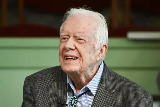 In this Nov. 3, 2019 file photo, former President Jimmy Carter teaches Sunday school at Maranatha Baptist Church in Plains, Ga. The Carter Center says Carter has entered home hospice care, Saturday, Feb. 18, 2023. The foundation created by the 98-year-old former president says that after a series of short hospital stays, Carter “decided to spend his remaining time at home with his family and receive hospice care instead of additional medical intervention." (AP Photo/John Amis, File)