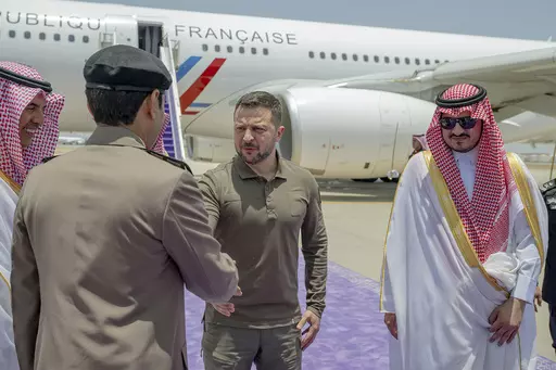 In this photo provided by Saudi Press Agency, SPA, Ukraine's President Volodymyr Zelenskyy, second right, is greeted by Prince Badr Bin Sultan, deputy governor of Mecca, right, upon his arrival at Jeddah airport, Saudi Arabia, Friday, May 19, 2023. Japan’s government officially announced Saturday that Zelenskyy is visiting Japan to join Group of Seven leaders in a session on Ukraine on Sunday. (Saudi Press Agency via AP, File)