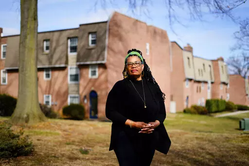 Elementary school teacher Kathleen Sannicks-Lerner, who is presently on sabbatical, poses for a photograph in Huntingdon Valley, Pa., Tuesday, March 8, 2022. (AP Photo/Matt Rourke)