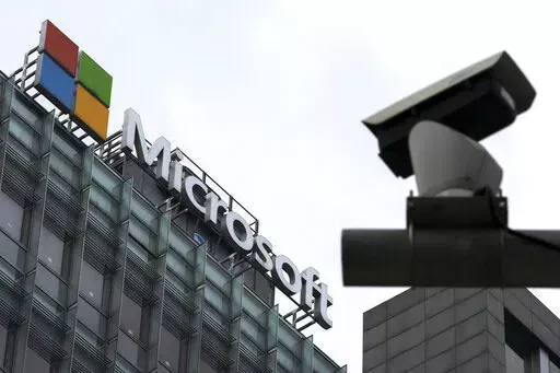 A security surveillance camera is seen near the Microsoft office building in Beijing, July 20, 2021. Microsoft says cyberattacks by state-backed Russian hackers have destroyed data across dozens of organizations in Ukraine and produced a “chaotic information environment.” The company said in a report released Wednesday, April 27, that Russia-aligned threat groups were preparing long before the Feb. 24 invasion. (AP Photo/Andy Wong, File)