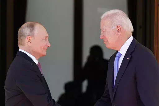 President Joe Biden and Russian President Vladimir Putin, arrive to meet at the 'Villa la Grange', June 16, 2021, in Geneva, Switzerland. While Biden has assured Russian President Vladimir Putin of economic consequences “like none he’s ever seen” if Russia invades Ukraine, some major European allies have demonstrated less overt enthusiasm for huge economic penalties. (AP Photo/Patrick Semansky, File)