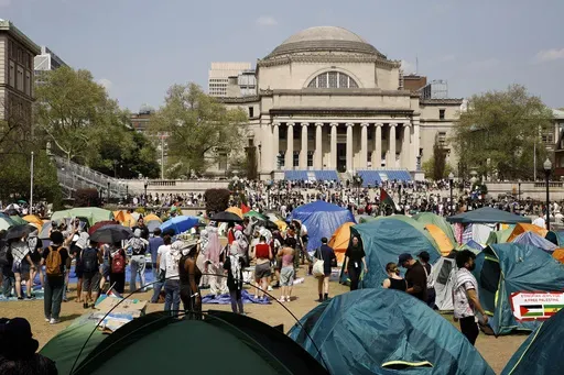 Student protesters gather inside their encampment on the Columbia University campus, April 29, 2024, in New York. (AP Photo/Stefan Jeremiah, File)