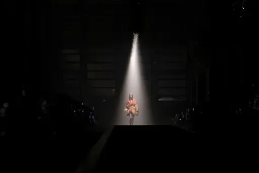 A model wears a creation as part of the Versace Fall/Winter 2025-2026 Womenswear collection presented in Milan, Italy, Friday, Feb. 28, 2025. (AP Photo/Luca Bruno)