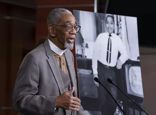 Rep. Bobby Rush, D-Ill., speaks during a news conference about the "Emmett Till Anti-Lynching Act" on Capitol Hill in Washington, on Feb. 26, 2020. Emmett Till, pictured at right, was a 14-year-old African-American who was lynched in Mississippi in 1955, after being accused of offending a white woman in her family's grocery store. Congress has given final approval to legislation that for the first time would make lynching a federal hate crime in the U.S. (AP Photo/J. Scott Applewhite, File)
