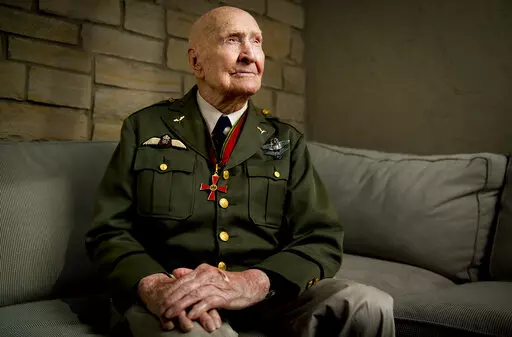 Gail Halvorsen, also know as the "Candy Bomber", poses for a portrait at his son's home in Midway, Utah, on Oct. 7, 2020. The man known as the "Candy Bomber" for his airdrops of sweets during the Berlin Airlift when World War II ended nearly 75 years ago has died. Gail Halvorsen was 101 when he died Wednesday, Feb. 16, 2022, in his home state of Utah surrounded by most of his children after a brief illness, James Stewart, the director of the Gail Halvorsen Aviation Education Foundation, said Thu