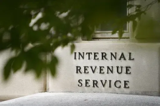 A sign is displayed outside the Internal Revenue Service building on May 4, 2021, in Washington. (AP Photo/Patrick Semansky, File)
