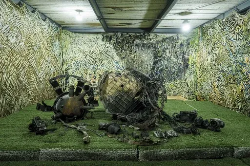 Fragments of a rocket which struck Dnipro on November 21 are seen at a center for forensic analysis in undisclosed location, Ukraine, Sunday Nov. 24, 2024. (AP Photo/Evgeniy Maloletka)