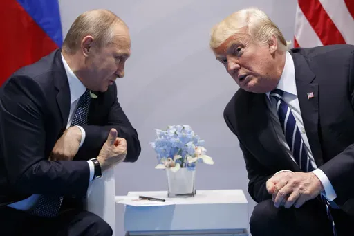 President Donald Trump, right, meets with Russian President Vladimir Putin at the G-20 Summit in Hamburg, July 7, 2017. (AP Photo/Evan Vucci, File)