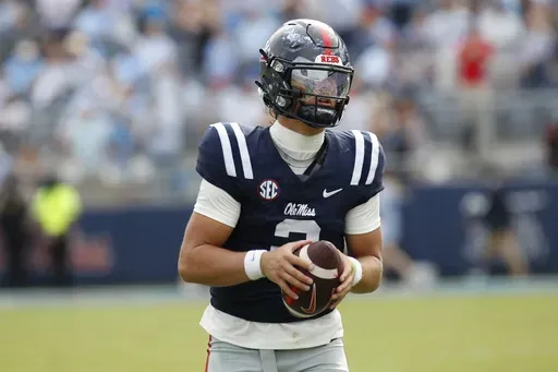Mississippi quarterback Jaxson Dart (2) stands on the field during a timeout in the second half of an NCAA college football game against Oklahoma, Saturday, Oct. 26, 2024, in Oxford, Miss. (AP Photo/Sarah Warnock)
